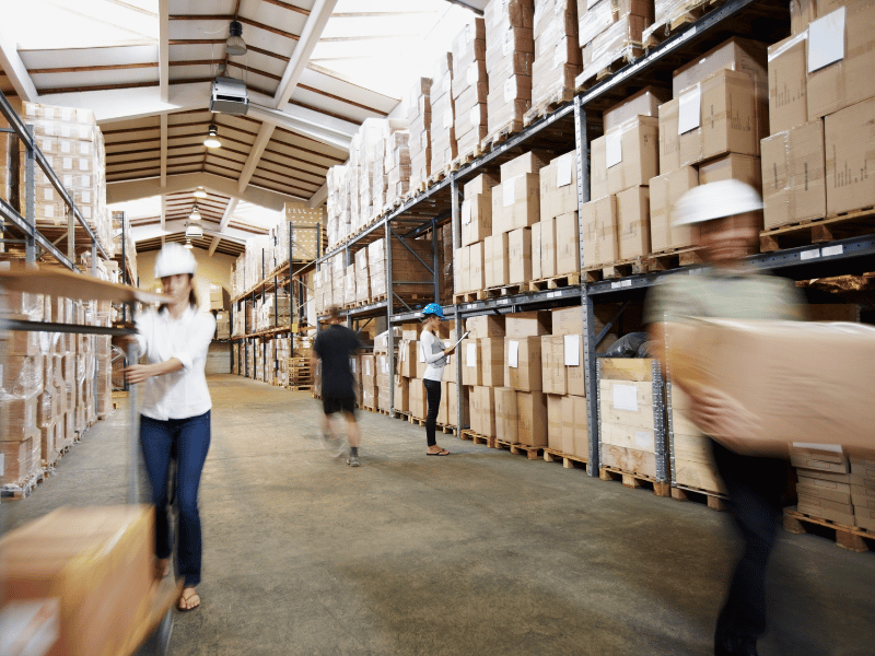 warehouse rack man inspecting electrical wires